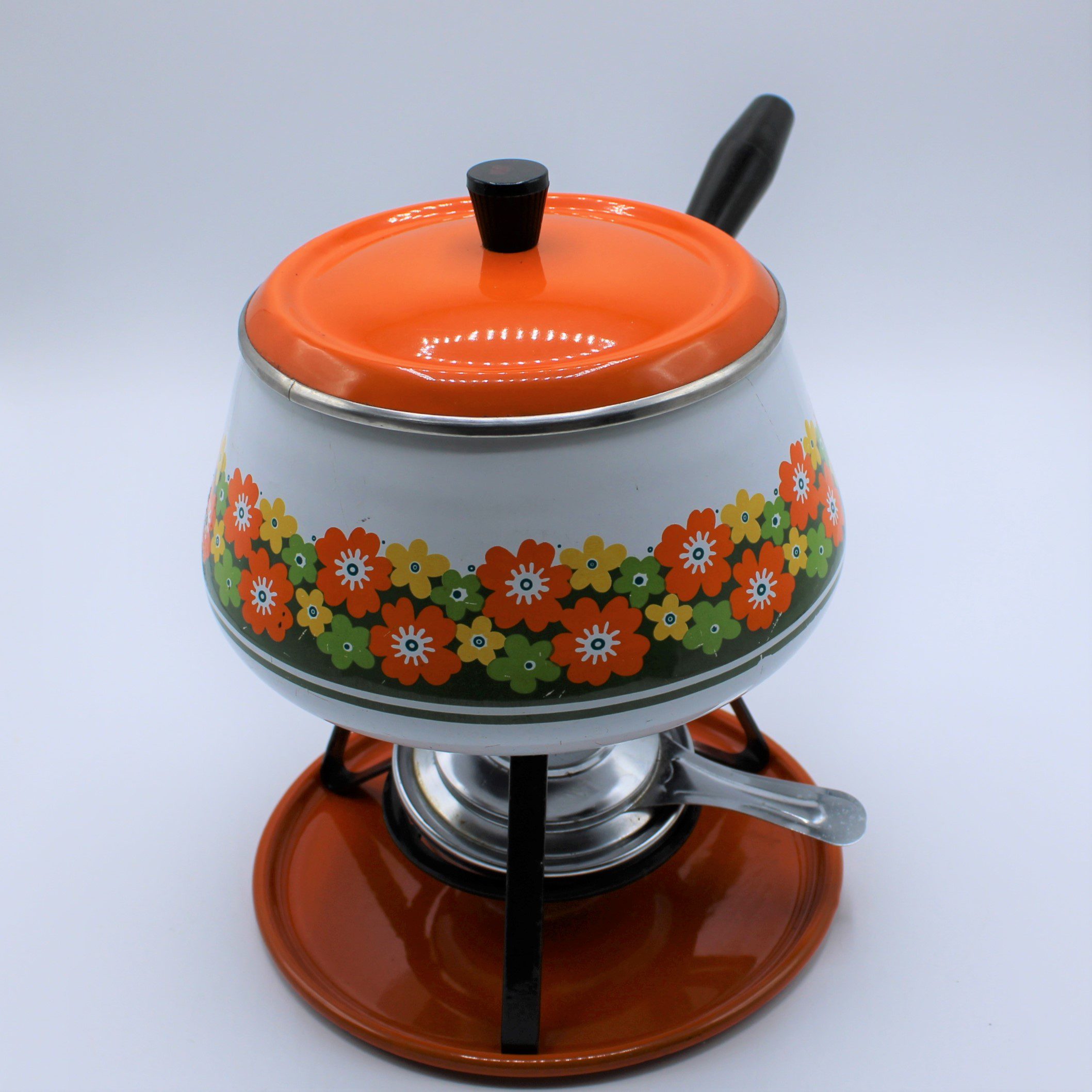 Vintage fonduepan met bloemenprint